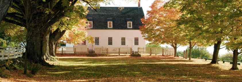 back yard in the fall with white house