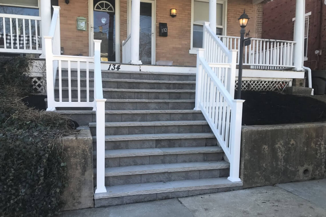 stone steps with white railings
