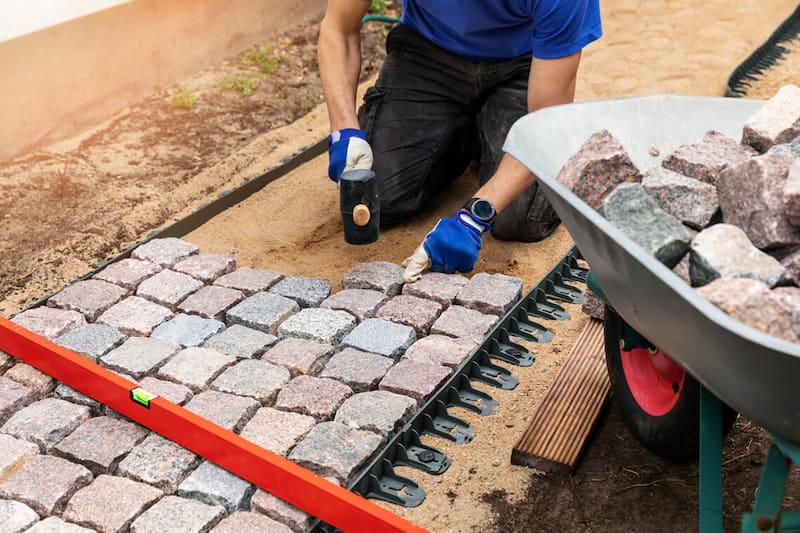 hardscape contractors laying pavers